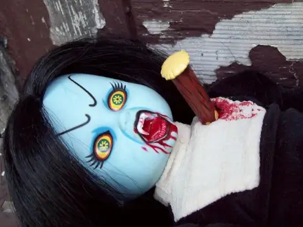 A vampire doll stabbed by a wooden spike