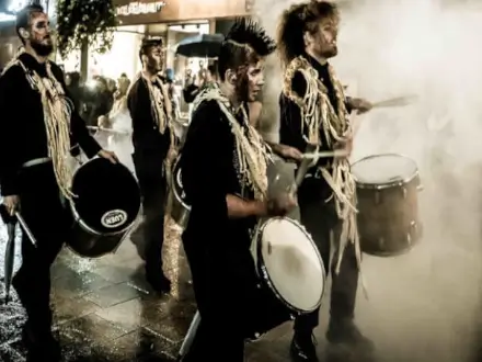 Four lads playing the drums on bram stoker festival night