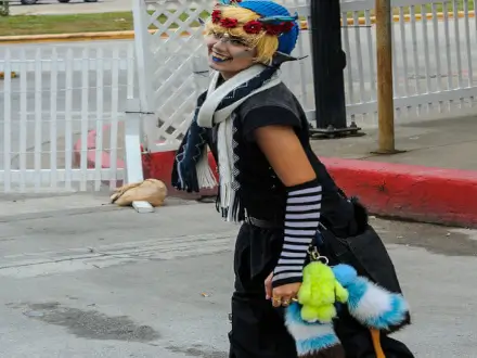 A colorful costumed girl, as dracula